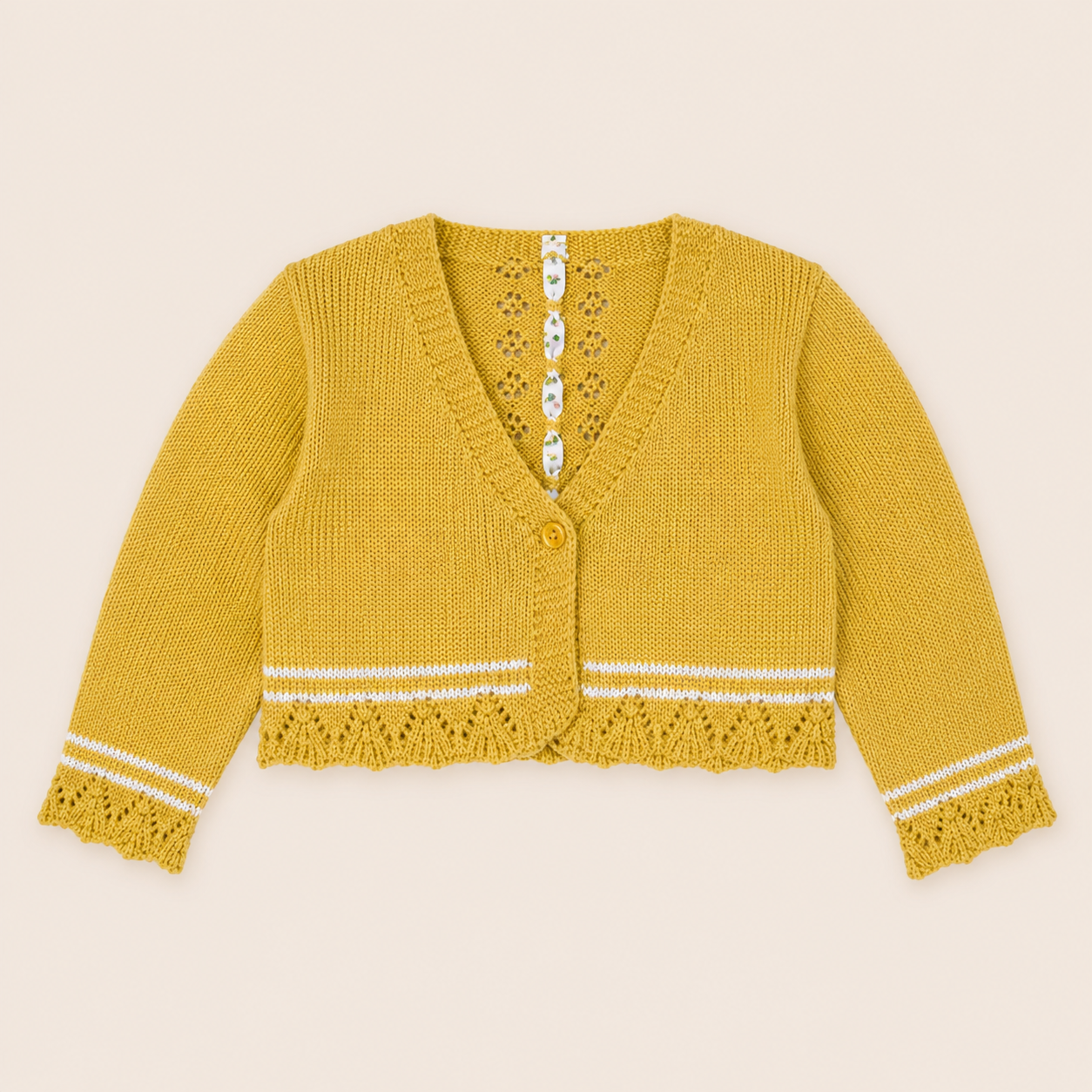 Bolero bebé em malha mostarda para menina